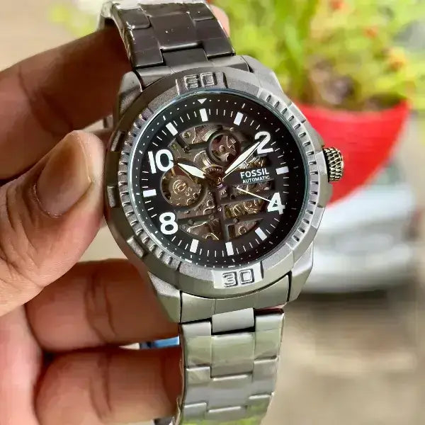 FOSSIL AUTO